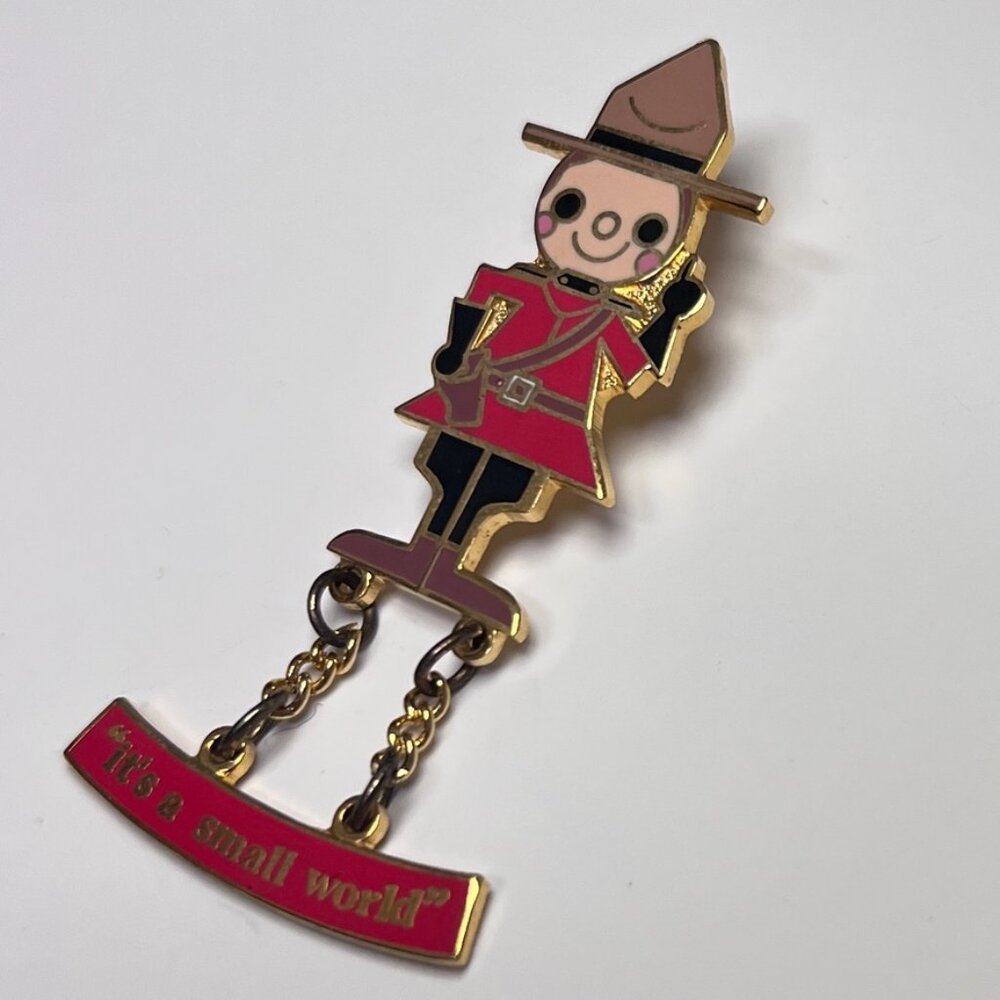 “it’s a small world” canadian mountie pin • dangle  • disney parks • 2001